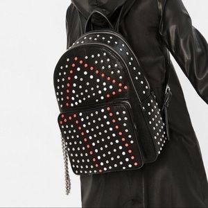 Studded Black Leather Backpack with Red & White Accents